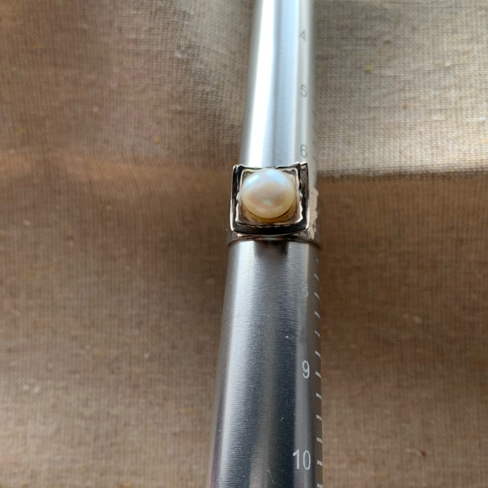 Silpada freshwater pearl on hammered band.
